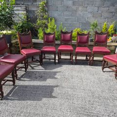 Victorian dining chairs crafted from oak with red leather upholstered seats