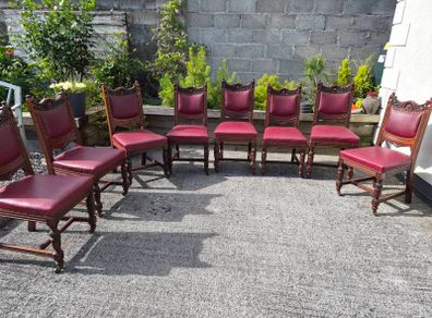 Victorian dining chairs crafted from oak with red leather upholstered seats