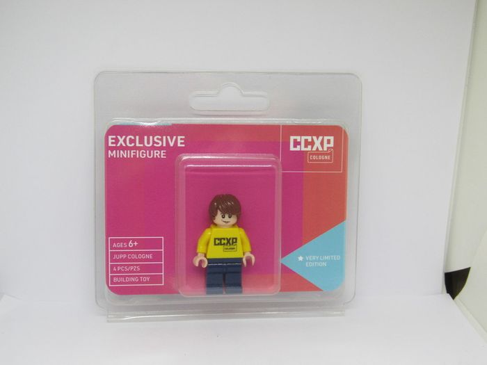 Lego Official Licensed CCXP Minifigure Exclusive  Licensed Minifigure Of The CCXP Series With Yellow Torso  The Figure Was Issued At The CCXP Comic Con Experience 2019 In Cologne And Limited Number Of 200 Pieces Made
