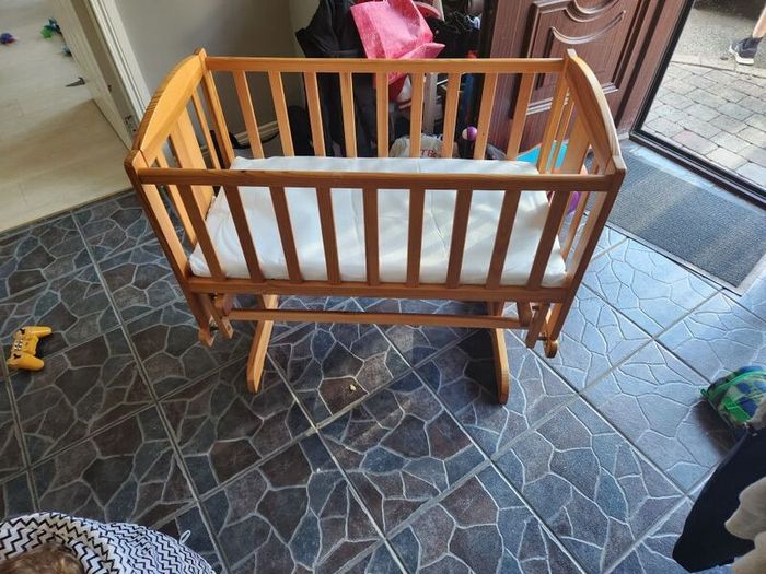 Wooden rocking crib