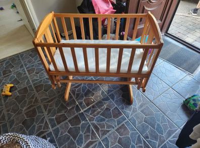 Wooden rocking crib