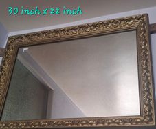 Gold framed mirror