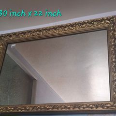 Gold framed mirror