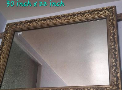 Gold framed mirror