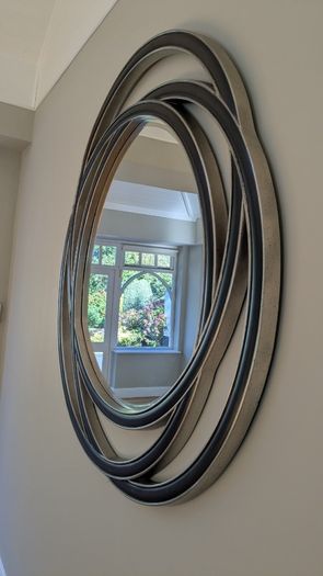 Contemporary circular wall mirror - black and silver finish