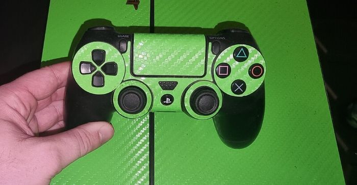 Playstation 4 with two controllers