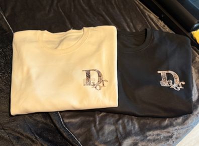 Two Dior Jumper's