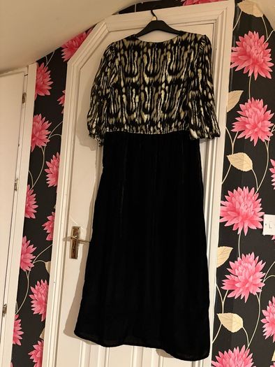 Black velvet dress, with gold shimmer bodice.