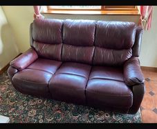 Burgundy comfy couch and arm chair