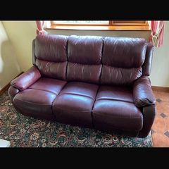 Burgundy comfy couch and arm chair