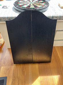 dart board and cabinet