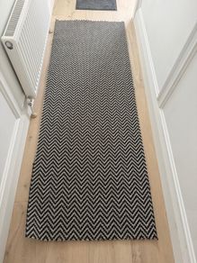 Rug black and cream