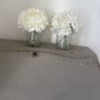 Pair of faux floral decorations with glass vases Image 2