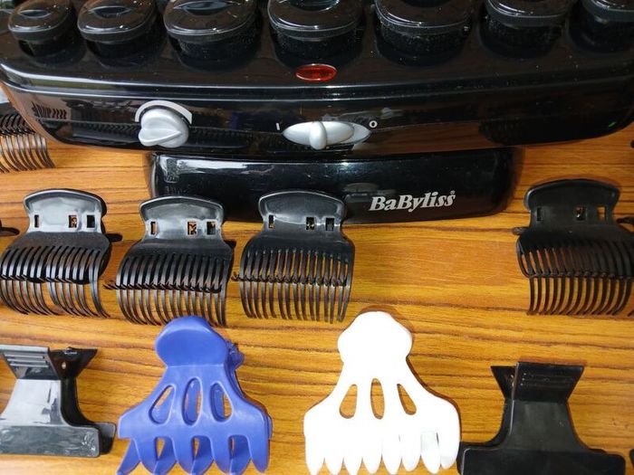 New BaByliss heated hair roller kit including rollers and clips.