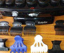 New BaByliss heated hair roller kit including rollers and clips.