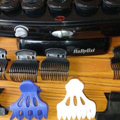 New BaByliss heated hair roller kit including rollers and clips.