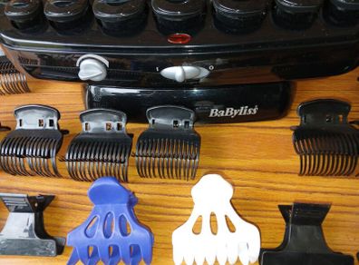New BaByliss heated hair roller kit including rollers and clips.