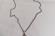 silver chain and  Celtic cross