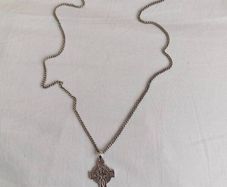 silver chain and  Celtic cross