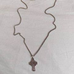 silver chain and  Celtic cross