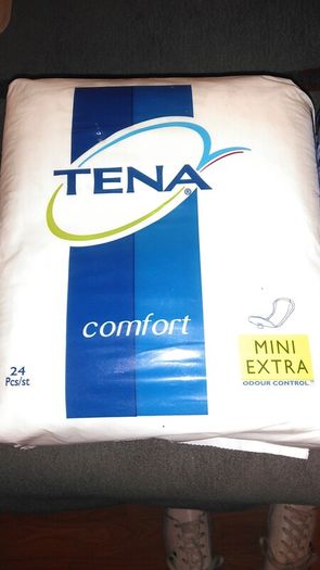 Tena lady