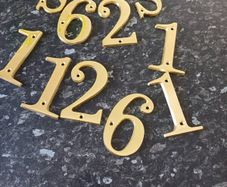Brass Numbers and Letter S