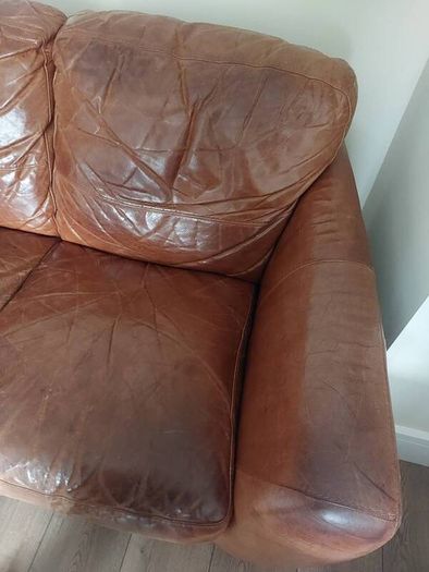 2 seater brown leather sofa. Approx 150cm width, approx 90cm breadth/ from back to front