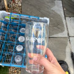 Guinness pint glass with crate