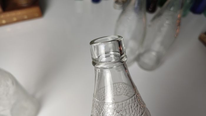 301 - Set of 4 Vintage Floral Decorative Collectible Clear Glass Tall Big Bottles
