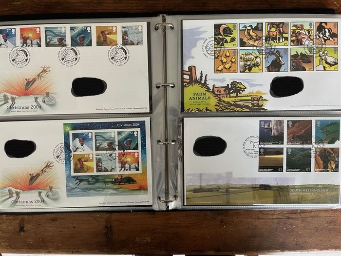 Collection of  87 UK First Day Cover stamps 2003 to 2006 in album