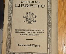 Official Libretto. The Original Italian, French And German Libretto With A Correct English Translation.  Le Nozzedi Figaro. In Good Condition.  See Photos For Same.