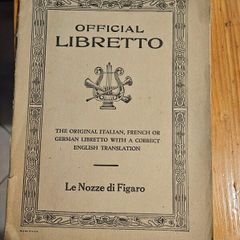 Official Libretto. The Original Italian, French And German Libretto With A Correct English Translation.  Le Nozzedi Figaro. In Good Condition.  See Photos For Same.