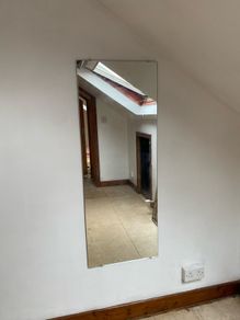 Frameless mirror