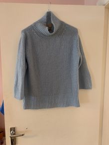 blue jumper Paul Costello studio