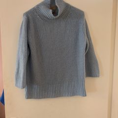 blue jumper Paul Costello studio