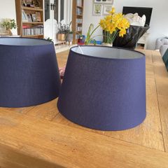 Two large navy lampshades