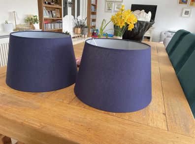 Two large navy lampshades