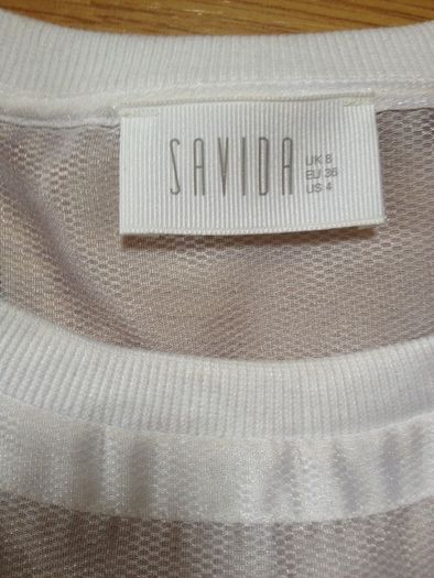 Never worn Savida sleeveless blouse