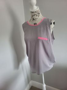 grey blouse with pink piping