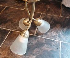 Gold three bulb light fitting