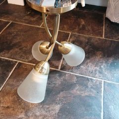 Gold three bulb light fitting