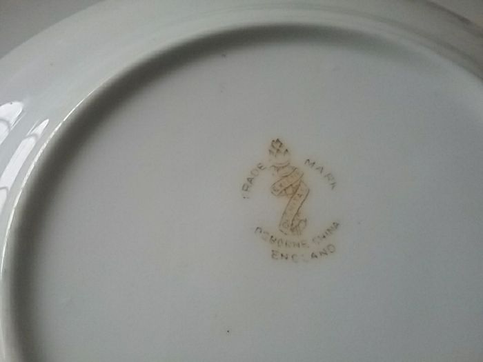 Eight Osbourne China Side Plates
