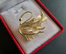 Elegant Gold Tone Swan Brooch with Champagne Color Cat Eye Stones and Crystal Pave Wings Vintage Style Bird Pin