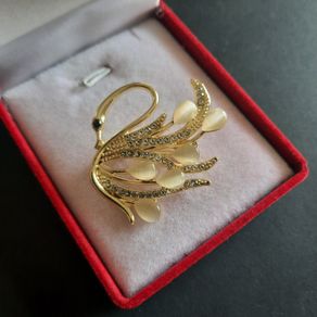 Elegant Gold Tone Swan Brooch with Champagne Color Cat Eye Stones and Crystal Pave Wings Vintage Style Bird Pin
