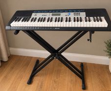 Casio CTK-1550 61-Key Electronic Keyboard + Adjustable Stand
