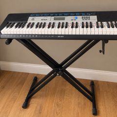 Casio CTK-1550 61-Key Electronic Keyboard + Adjustable Stand