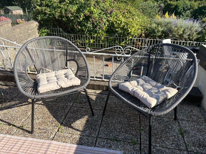 Pair of woven garden chairs