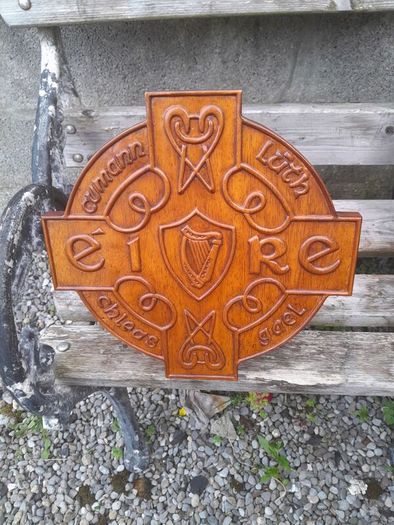 carved g.aa.a shield