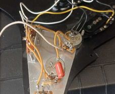 Strat pickguard wired with Fender Noiseless and premium components