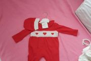 red loveheart babygro with matching hat